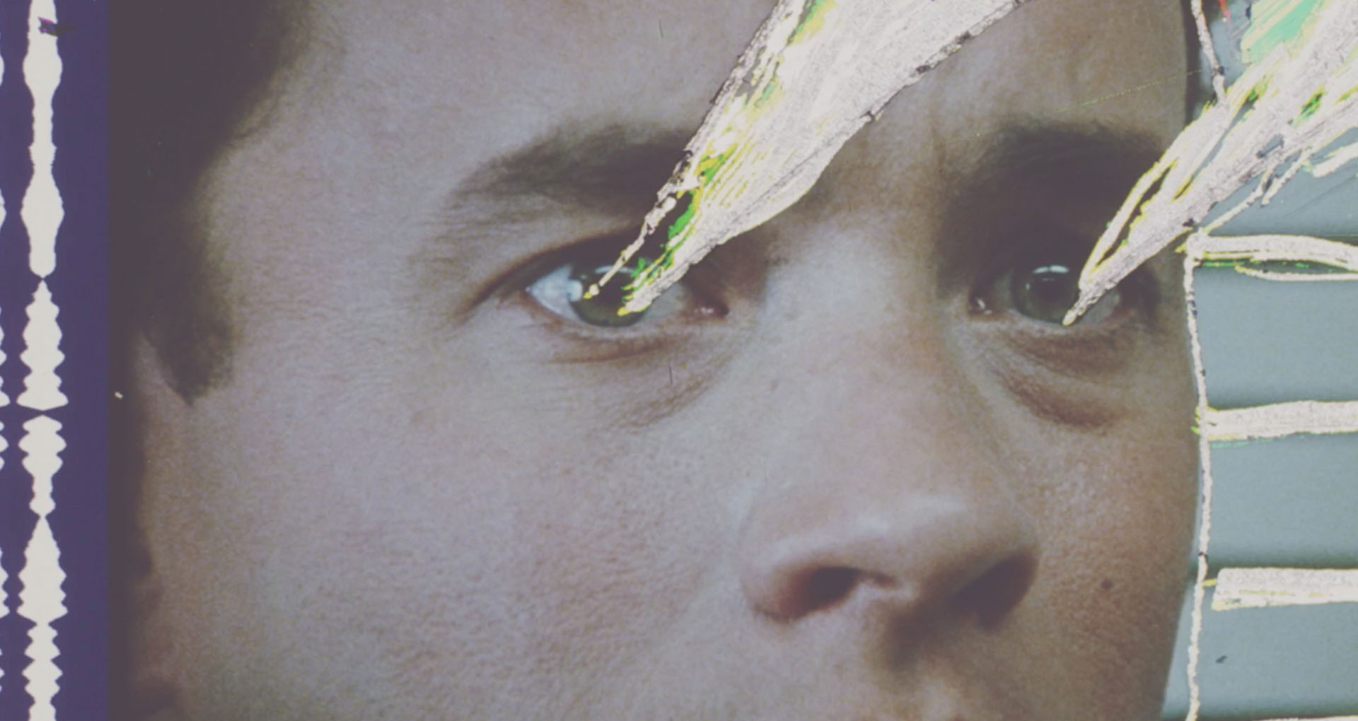 Steven Woloshen, Uprising, 2019 Image couleur, le visage d'un homme, des rayons lumineux sortent de ses yeux