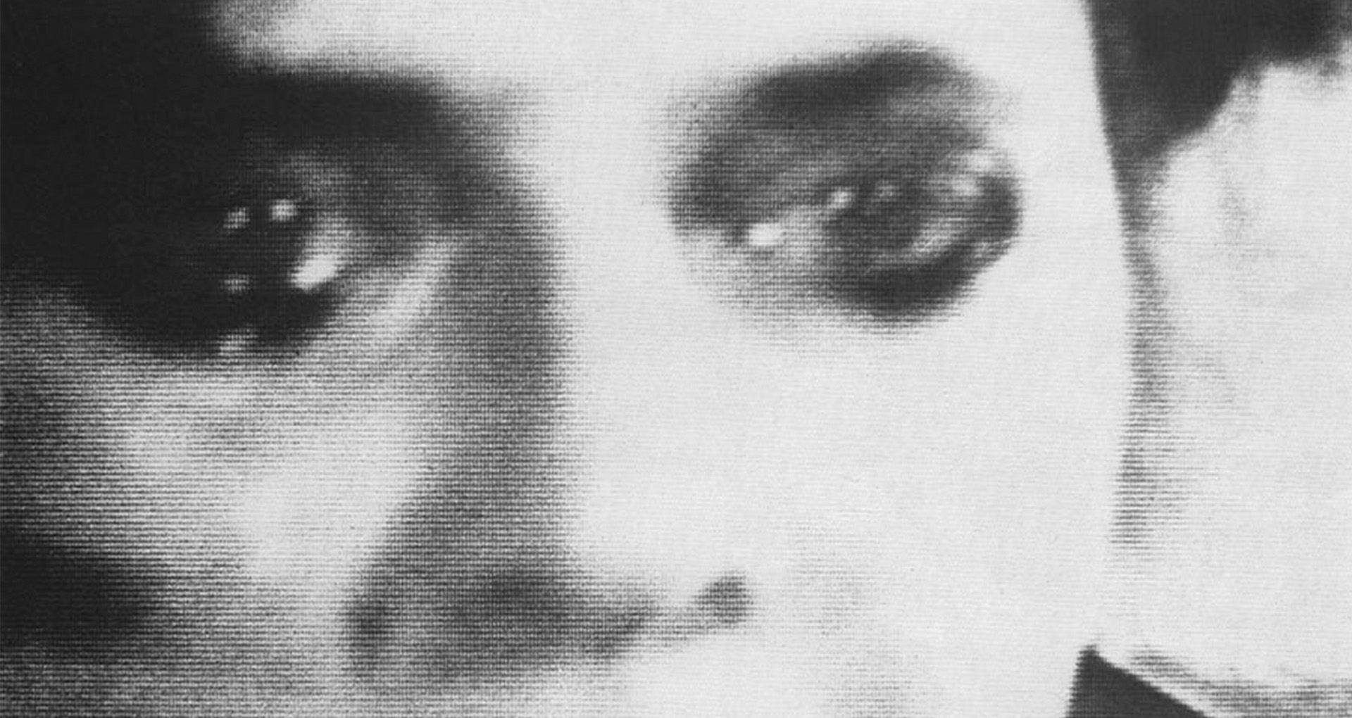 Black and white image. The eyes of a woman in close-up.